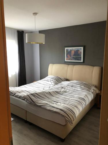 Postel nebo postele na pokoji v ubytování Wohnung in ruhiger Wohnlage