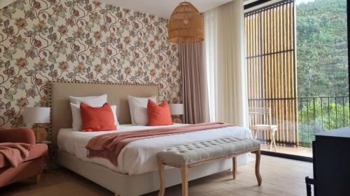 Una cama o camas en una habitación de Quinta das Levadas - Country House & Nature