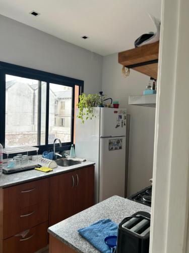 Køkken eller tekøkken på Casa Naranja habitaciones privadas