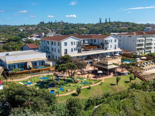 an aerial view of a resort with a park at Margate Beach Club in Margate