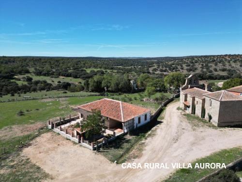 にあるComplejo Rural Dehesa de Itueroの建物のある農場の空中風景