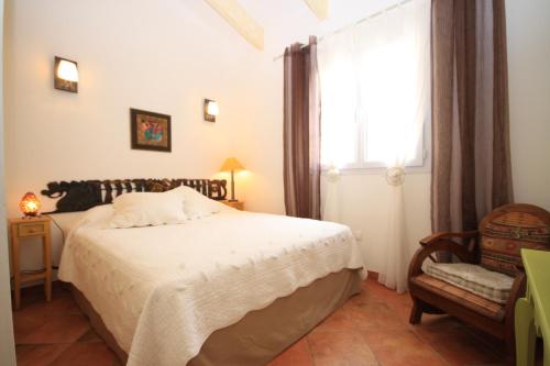 מיטה או מיטות בחדר ב-Casa Sultana