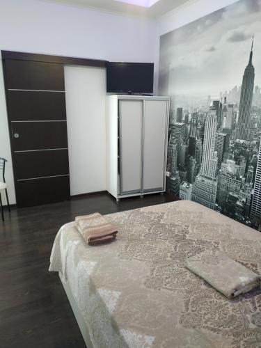 Кровать или кровати в номере Central Apartment