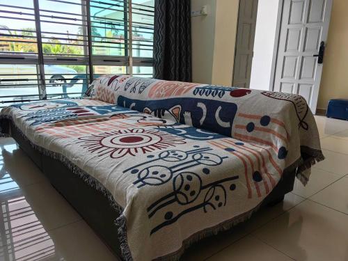 Katil atau katil-katil dalam bilik di Yi Jiu Homestay