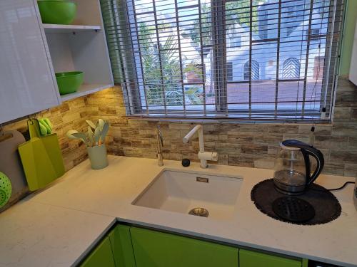 Фотография из галереи Amatoni green apartment в Стелленбосе