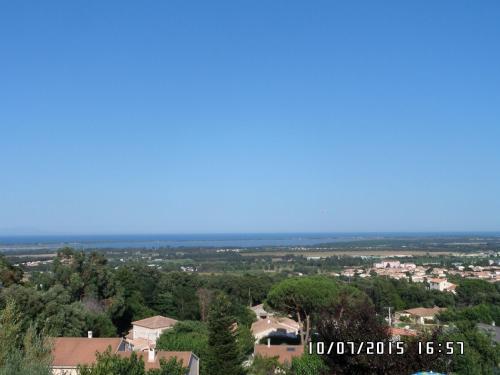 a view of the suburbs from the top of a house at Appartements Luccisano in Borgo