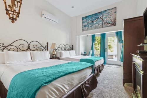 Ένα ή περισσότερα κρεβάτια σε δωμάτιο στο The Columbia Inn at Peralynna