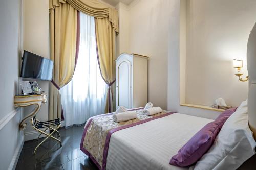 Ένα ή περισσότερα κρεβάτια σε δωμάτιο στο B&B La Terrazza Sul Duomo