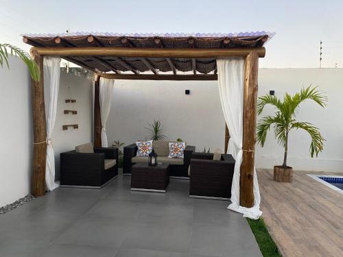 Χώρος καθιστικού στο CASA COM PISCINA NA PRAIA