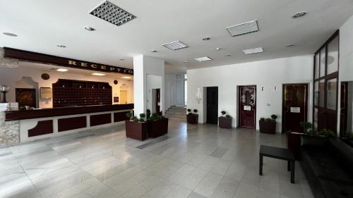 a lobby of a hotel with a reception desk at Hotel Gorna Banya in Sofia