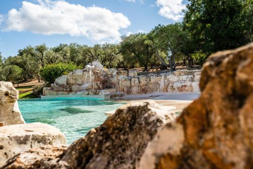 a view of a pool at a theme park at Sopra i Sassi - Villa & Trulli in Ostuni