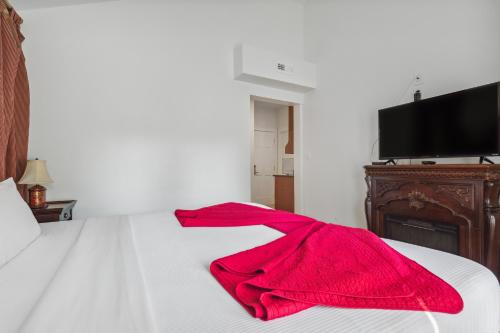 Ένα ή περισσότερα κρεβάτια σε δωμάτιο στο The Columbia Inn at Peralynna