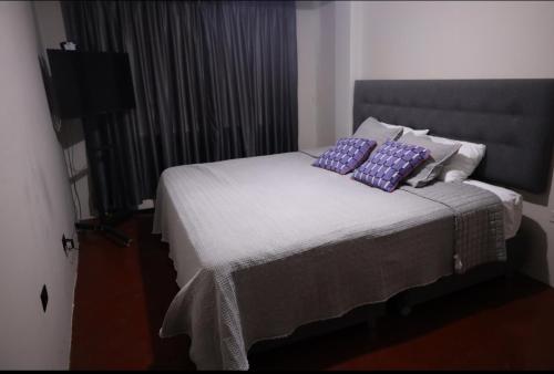 En eller flere senge i et værelse på Casa Sabina