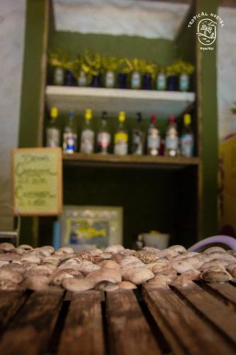 a pile of pretzels sitting on top of a table at Tropical Hostel in Pipa
