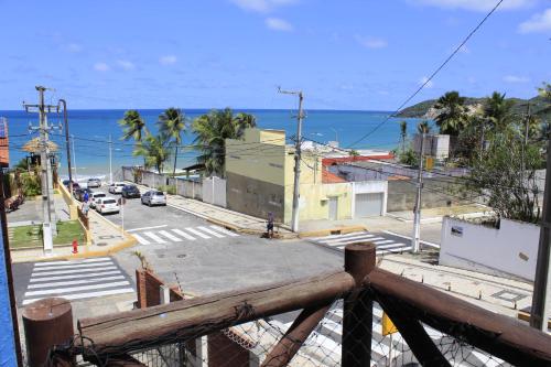 a view of a city with the ocean in the background at Sunbrazil Hotel - Antigo Hotel Terra Brasilis in Natal