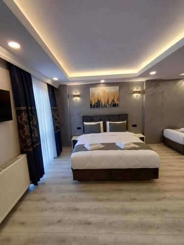 a bedroom with a large bed in a room at White Palace Haliç in Istanbul