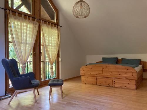 Ένα ή περισσότερα κρεβάτια σε δωμάτιο στο Ferienhaus Pferdehof Birkholz