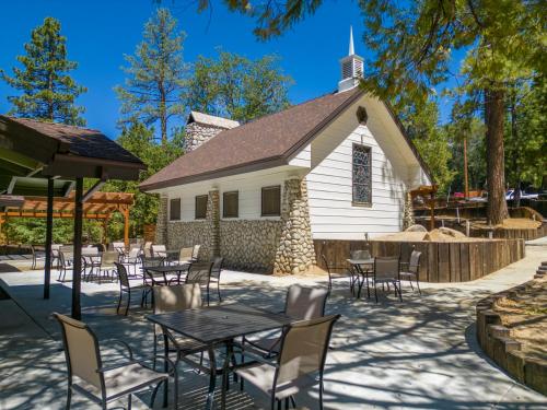 a church with tables and chairs in front of it at Tahquitz Pines Retreat in Idyllwild