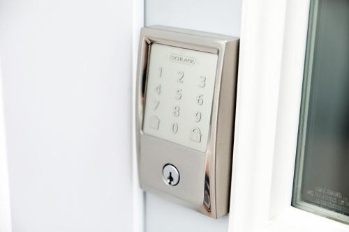 a wii remote control is attached to a window at Downtown 3 Queen Beds, AC, Double Garage, Disney in Edmonton