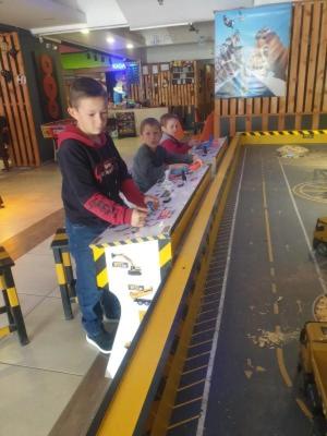 a group of children playing on a bowling alley at Çiftlik otel 