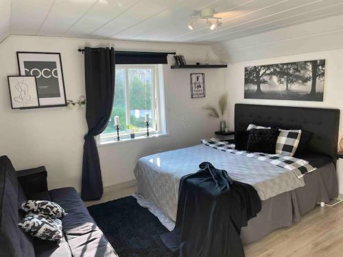 Cama o camas de una habitación en Harmonisk Villa