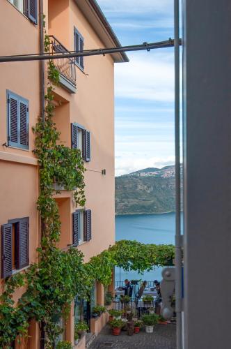 a view of the water from a building at Casa Matta in Castel Gandolfo