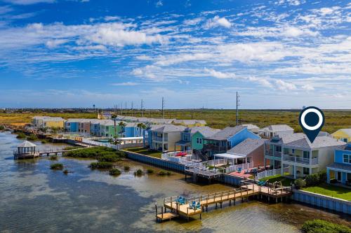an aerial view of a village on the water at Las Joyas Bayview Home in Port Isabel