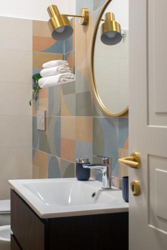 a bathroom with a sink and a mirror at Casa Matta in Castel Gandolfo