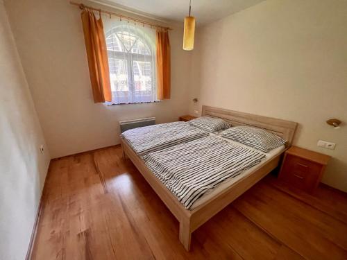 Postel nebo postele na pokoji v ubytování Apartman Laura - Chopok Tale