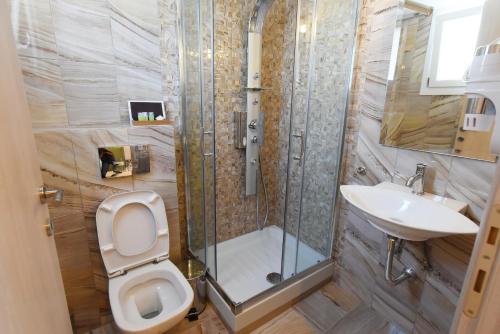 Ένα μπάνιο στο Edem Luxury Apartments 