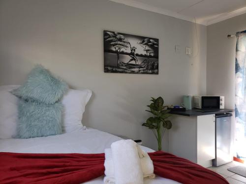 Ένα ή περισσότερα κρεβάτια σε δωμάτιο στο BnB Panorama