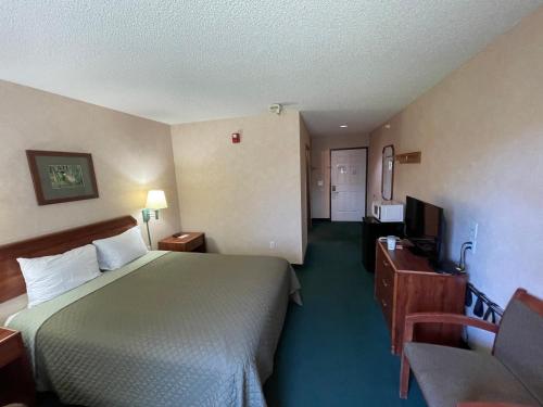 Postel nebo postele na pokoji v ubytování Hotel Yuma
