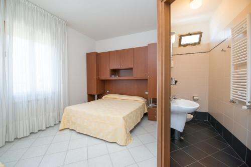 Koupelna v ubytování Albergo Arcobaleno