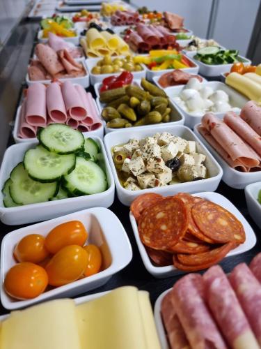 a buffet of different types of food on a table at Haiminger Hof in Haiming