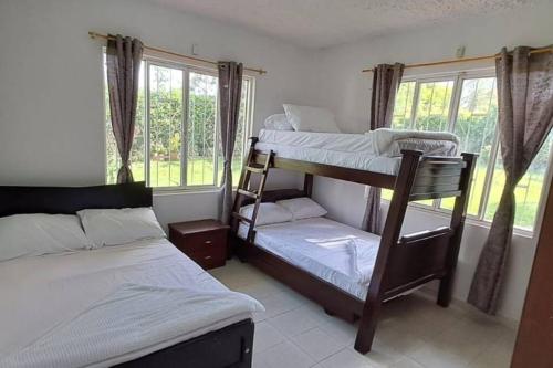 Krevet ili kreveti na kat u jedinici u objektu Casa Campestre para relajarse