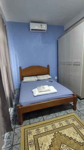 מיטה או מיטות בחדר ב-Apartamento aconchegante em Cacoal1