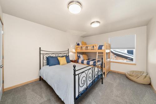 a bedroom with a bed and a window at Sand Dollar House MCA#50380 in Manzanita