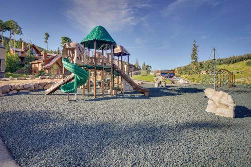a park with a playground with a slide at Brian Head Ski Condo - Walk to Giant Steps Lift! in Brian Head