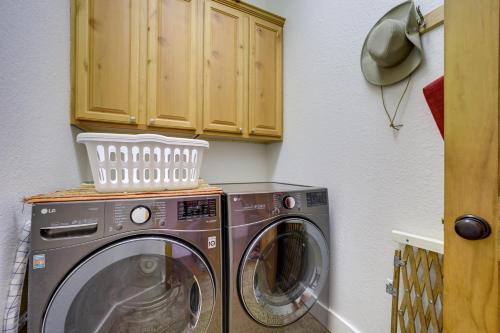 a washer and dryer in a small kitchen with at Sapphire Vacation Rental Less Than 1 Mi to Whisper Lake! in Sapphire