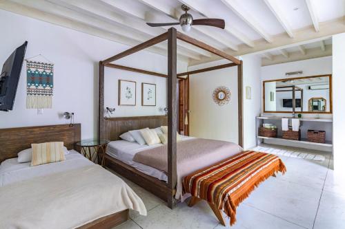 Ένα ή περισσότερα κρεβάτια σε δωμάτιο στο Casa Pochote