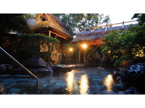a pool of water in front of a building at Asanoya - Vacation STAY 01715v in Shinonsen