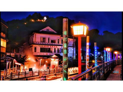 a street light in front of a building at night at Asanoya - Vacation STAY 01715v in Shinonsen