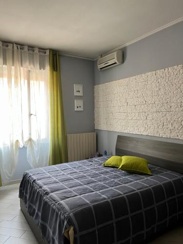En eller flere senger på et rom på Saranà Intero Appartamento - San Giuliano (Milano)