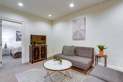 a living room with a couch and a tv at World Cup Getaway! Walkable Dtwn Seattle Condo in Seattle