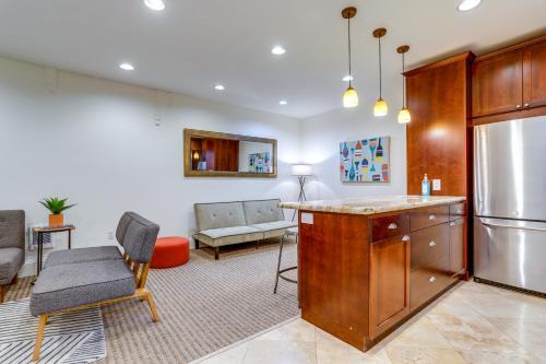 a living room with a kitchen with a refrigerator at World Cup Getaway! Walkable Dtwn Seattle Condo in Seattle