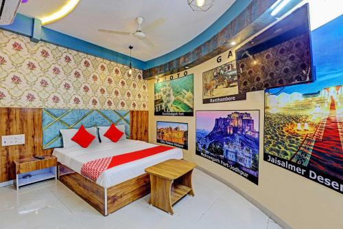 Cama ou camas em um quarto em OYO Flagship Hotel Metro