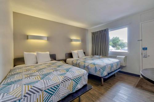 Ένα ή περισσότερα κρεβάτια σε δωμάτιο στο Motel 6-Oshkosh, WI