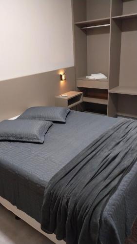 Ένα ή περισσότερα κρεβάτια σε δωμάτιο στο Flat's Da Bia