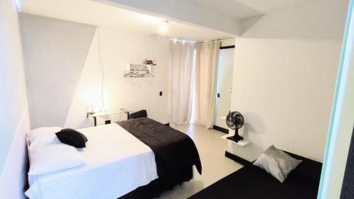 Ένα ή περισσότερα κρεβάτια σε δωμάτιο στο Casa (2)