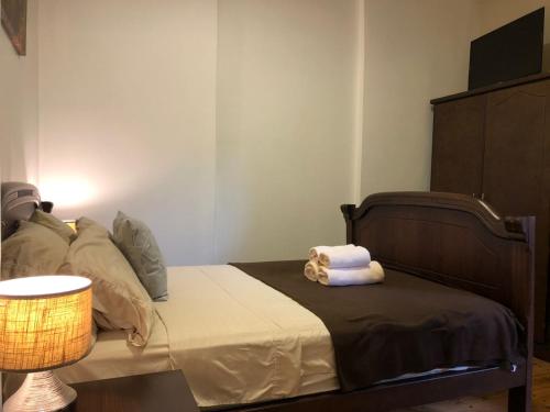 Una cama o camas en una habitación de HOTEL en el CENTRO HISTORICO